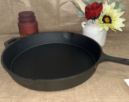 Black cast iron pan sold by Leroys Cajun Cookware LLC