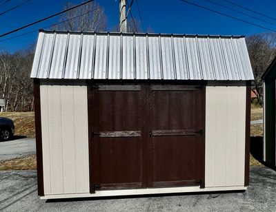 beige shed with double doors
