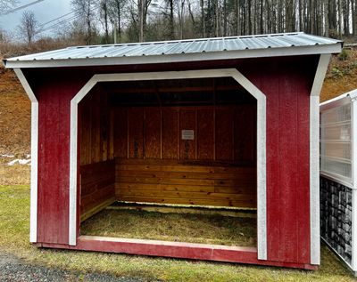 red run-in shed with open doorway
