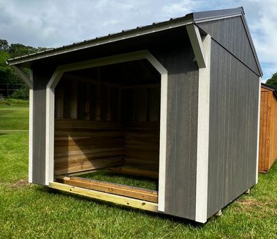 gray run-in shed with open doorway