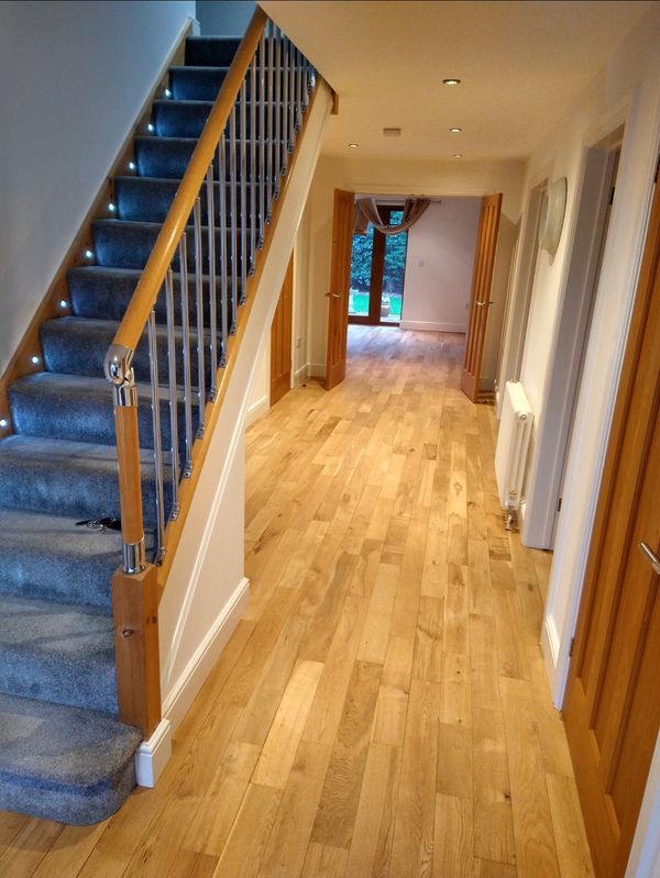 Modern home with solid oak floors in hallway, kitchen, lounge. flooring specialists sanded, stained