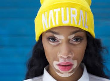 Woman wearing natural Cab on head