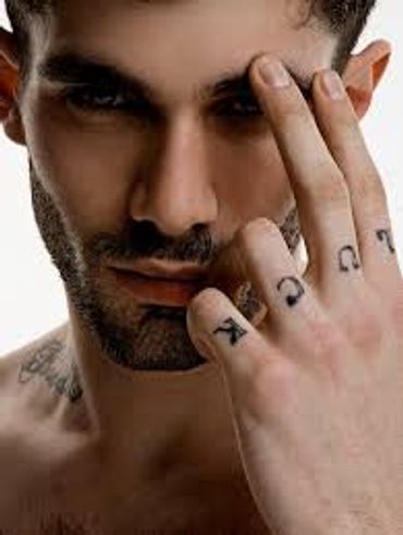 A man hold the hands on face with looking ahead