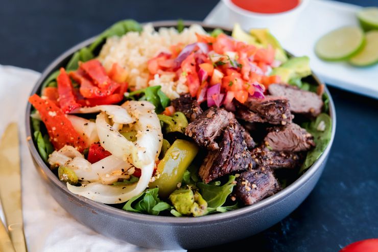 Steak Fajita Power Bowl with peppers and onions