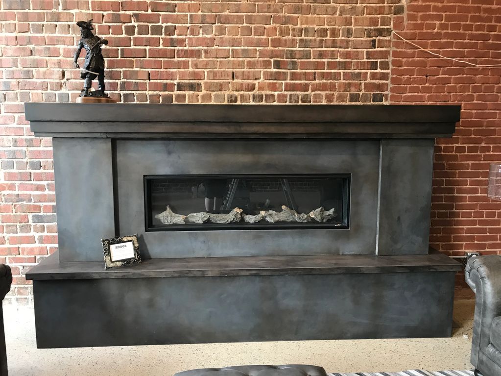 Concrete fireplace hearth mantle tile precast Mud Haus Wichita Kansas