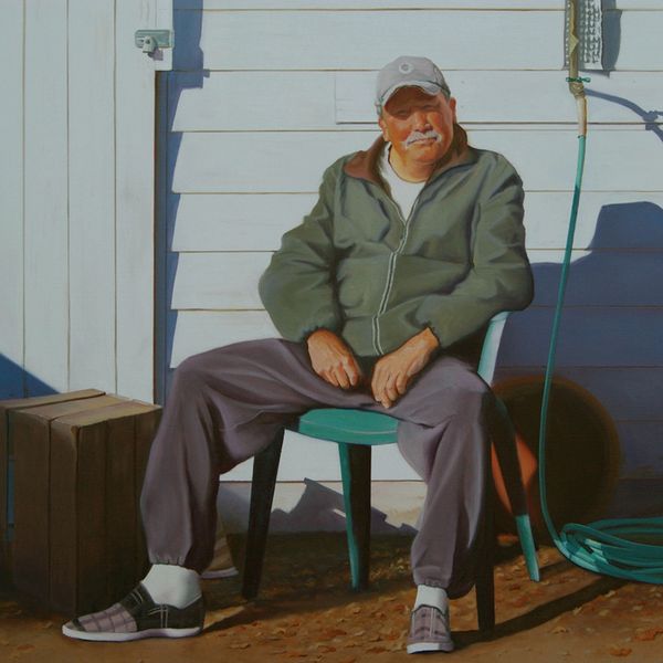 This gentleman was sitting outside his home, waiting to pick up his granddaughter from school.