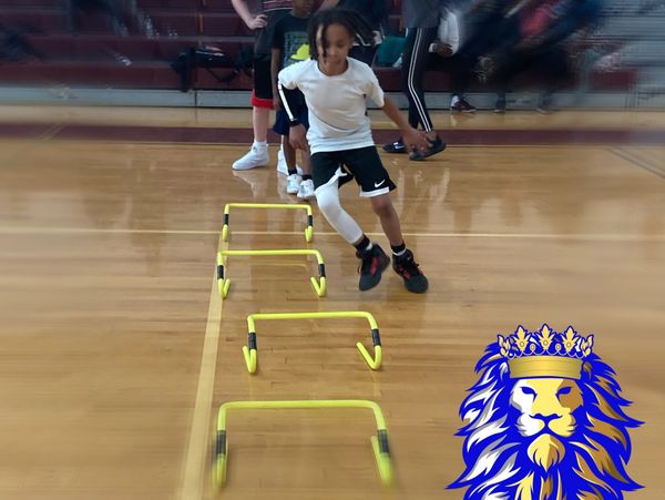 Dominion Youth Inc male basketball player learns agility training during basketball training