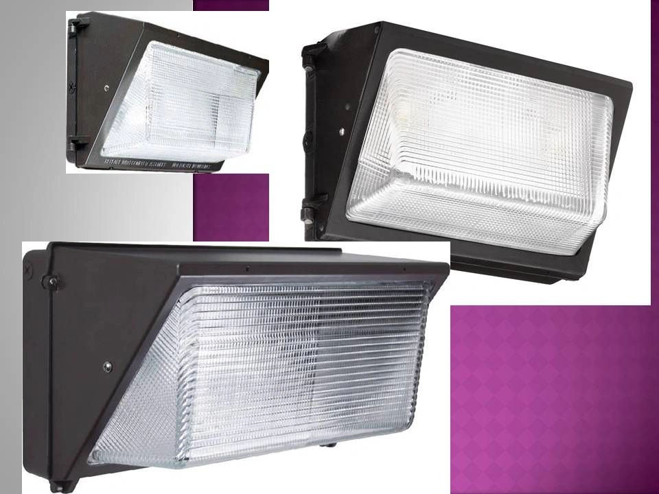 Three black outdoor wall-mounted floodlights with clear protective covers.