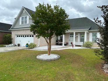 Ornamental tree and bush trimming by Salty Dog Lawn Care