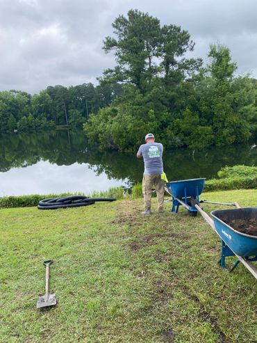 Backyard drainage repair and foundation water diversion by Salty Dog