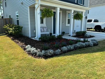 Premium plant installation and fresh mulch landscaping in Leland NC