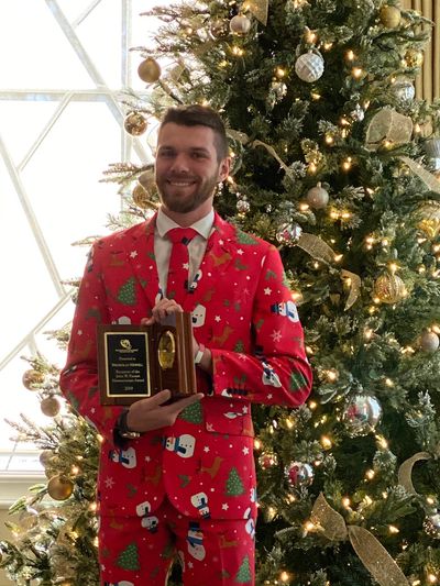 Nicholas Newell receives award from Cape Fear Realtors