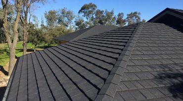 Malarkey roof shingles, roof repair services, roof flashing repair, roof leak repair, black shingles