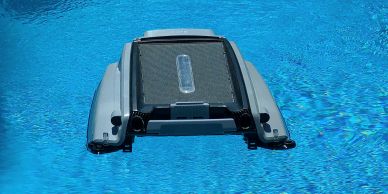 A robotic pool cleaner in a swimming pool.