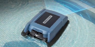 Robotic pool cleaner operating in a pool.