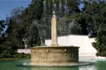 Stone fountain with water.