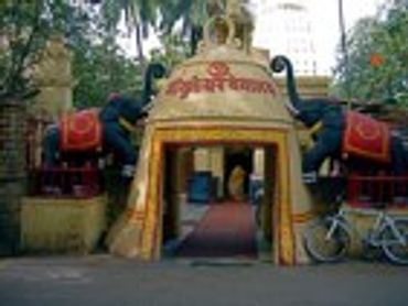 Small religious shrine outdoors.