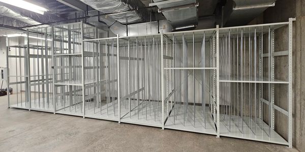 Empty storage racks in an industrial setting.