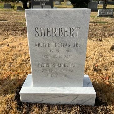 single marble tombstone with flat top