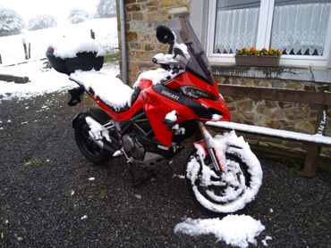 Owner's red Ducati in the snow