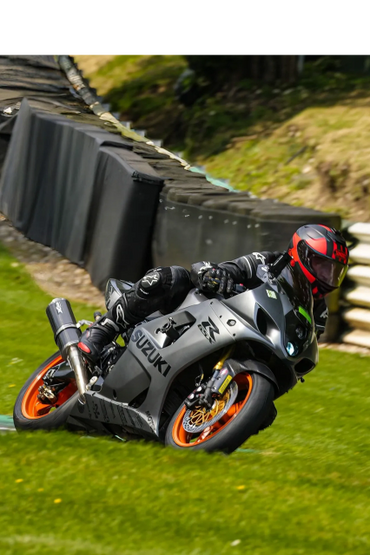 Motorbike track-day showing owner Jamie Clare on his Suzuki
