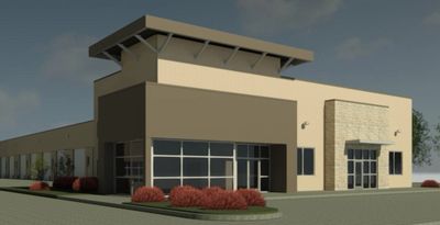 Architectural rendering of one of our buildings with an office in the front and luxury garages.