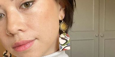 tori tsui in earrings