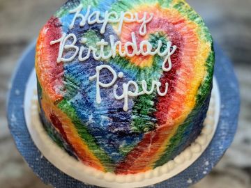 Colorful tie-dye birthday cake for Pipiru.