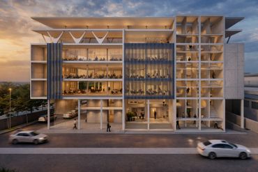 Modern office building with glass walls and illuminated interiors at dusk.