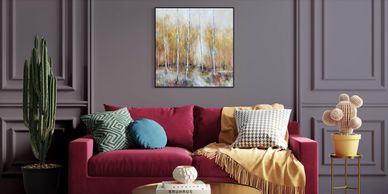 Stylish living room with a red sofa and vibrant cushions.