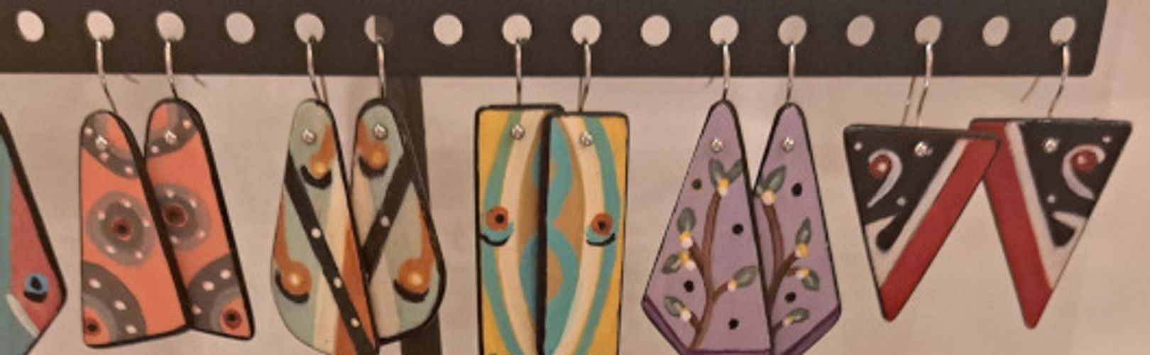 Handpainted wood earrings - each an original work of art - by Kath Riley of Snohomish, Washington.