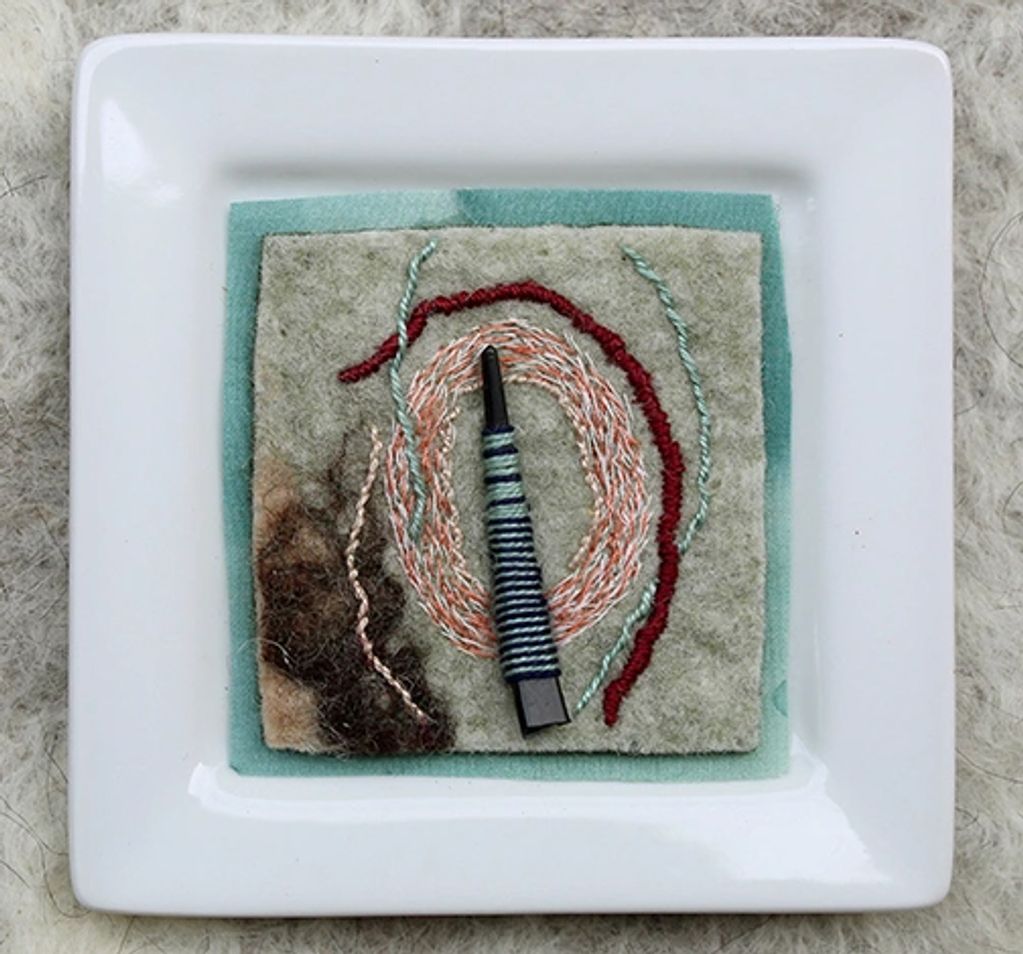 Kim Paxson, fiber art. mixed media.
Artist-made wool felt, hand embroidered,