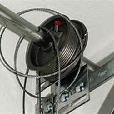 Garage door repairs such as broken torsion springs and cables