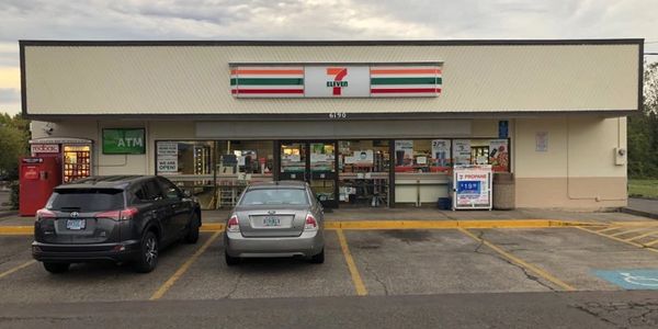 The outside of a freshly painted 7-11