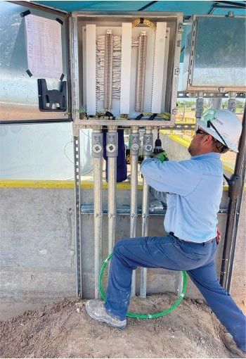 TF Electrical installing new equipment for a midstream pipeline operator.