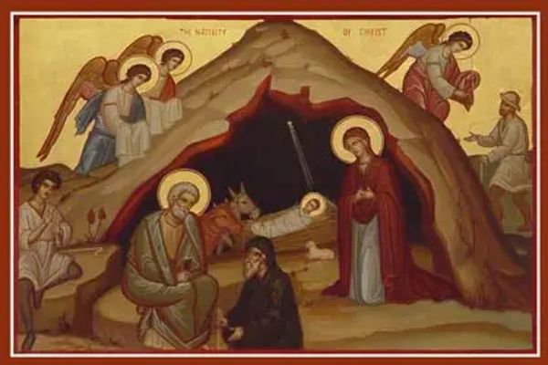 Nativity scene with angels, Mary, Joseph, and baby Jesus in a cave.