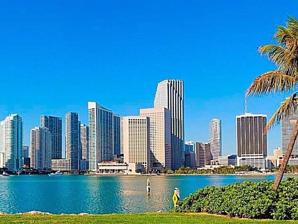 City skyline by the water on a clear day.