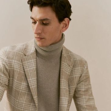 Man in sport coat and knitwear outfit