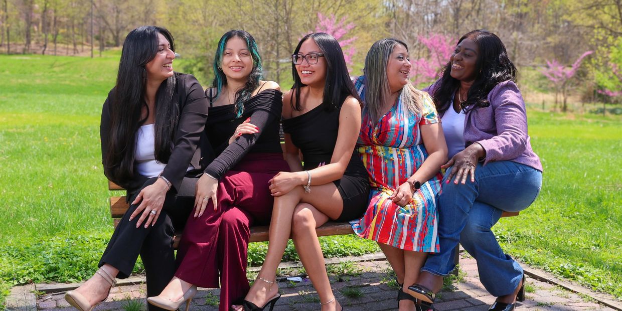 group of people smiling at each other