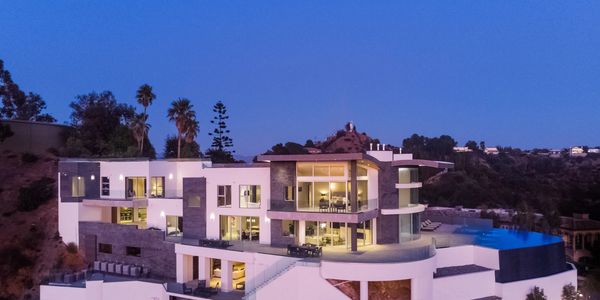 Elevate your living with this breathtaking 15,280-square-foot estate in Beverly Hills. 