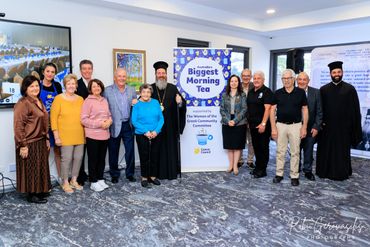 Group photo at Australia's Biggest Morning Tea event supporting cancer awareness.