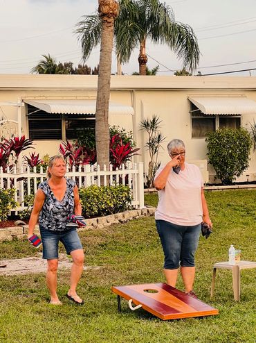 Playing a game of Corn Hole