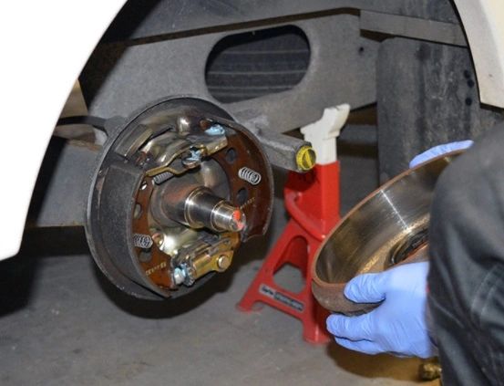 Close-up of a caravan brake being serviced at the Neerabup workshop