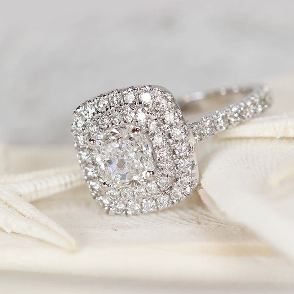 Double halo cushion-cut diamond ring