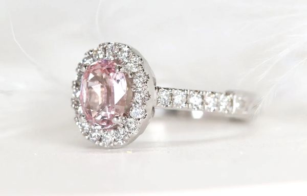 Halo oval-cut pink sapphire ring