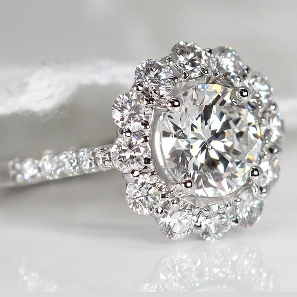 Flower halo round diamond engagement ring