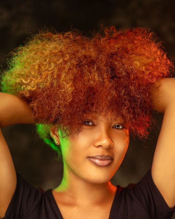 A person with curly hair