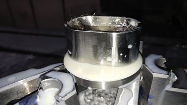 Stainless Steel 304 being machined into exhaust port inserts for Dodge Stealth