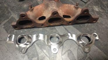 Dodge Stealth exhaust manifold plate with converging port inserts made from Stainless Steel 304 
