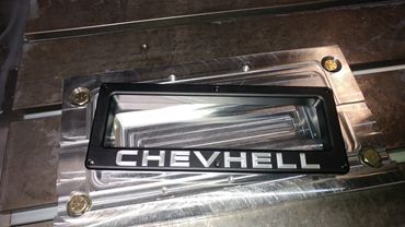 Bezel Plate for 1968 Chevelle with custom text. Black Anodized Aluminum with post Anodizing engravin
